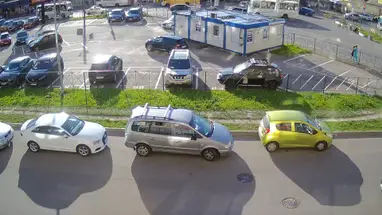 Estacionamento na Praça Privokzalnaya, 2A, Murino webcam ao vivo