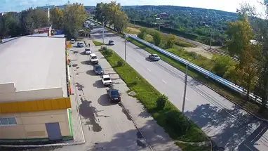 Веб-камера Супермаркет «Мария-Ра» на улице Социалистической. в реальном времени