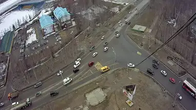 Kruispunt van Neftchinikovstraat en 60 jaar oktober online-webcam